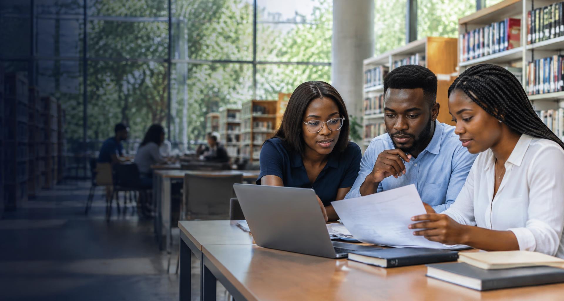 Illustrative scene of university students analysing information together